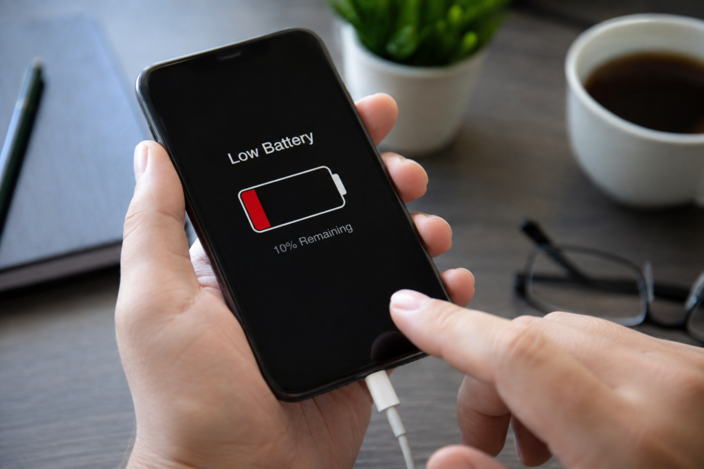 Phone screen showing smartphone battery drain settings